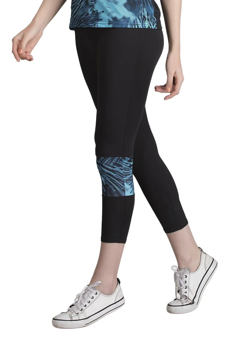 Clovia Green Snug-Fit High-Rise Active Capri Tights in Black with Printed Panel for Women | Best Price UAE